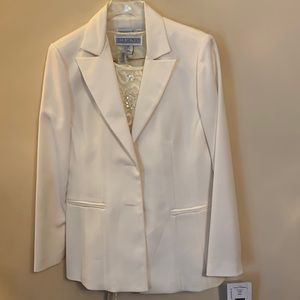 Three piece ivory suit.